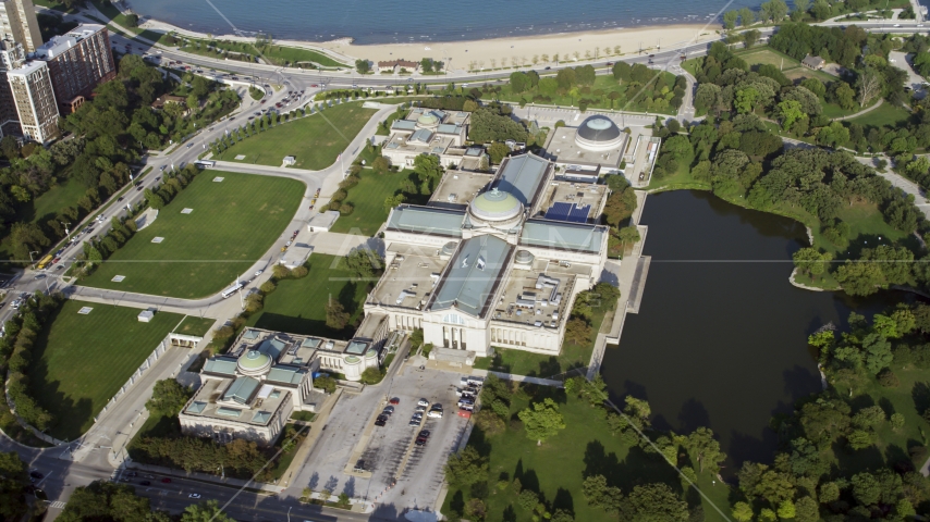 A side view of the Museum of Science and Industry, Hyde Park, Chicago, Illinois Aerial Stock Photo AX0001_010.0000301F | Axiom Images