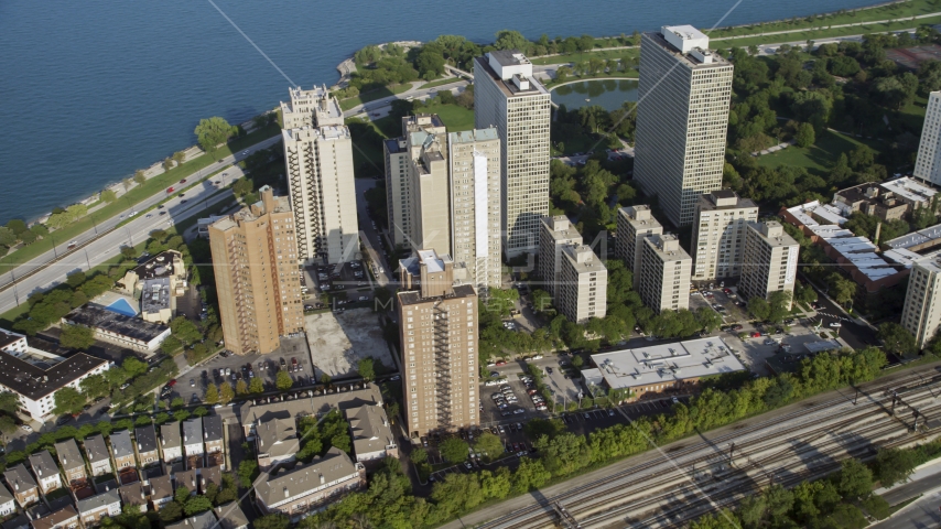 A group of lakefront apartment buildings in Hyde Park, Chicago, Illinois Aerial Stock Photo AX0001_012.0000407F | Axiom Images