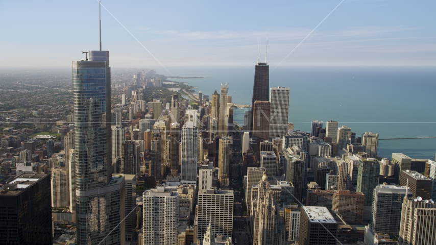 Trump International and John Hancock Center in Downtown Chicago, Illinois, on a hazy day Aerial Stock Photo AX0001_028.0000086F | Axiom Images