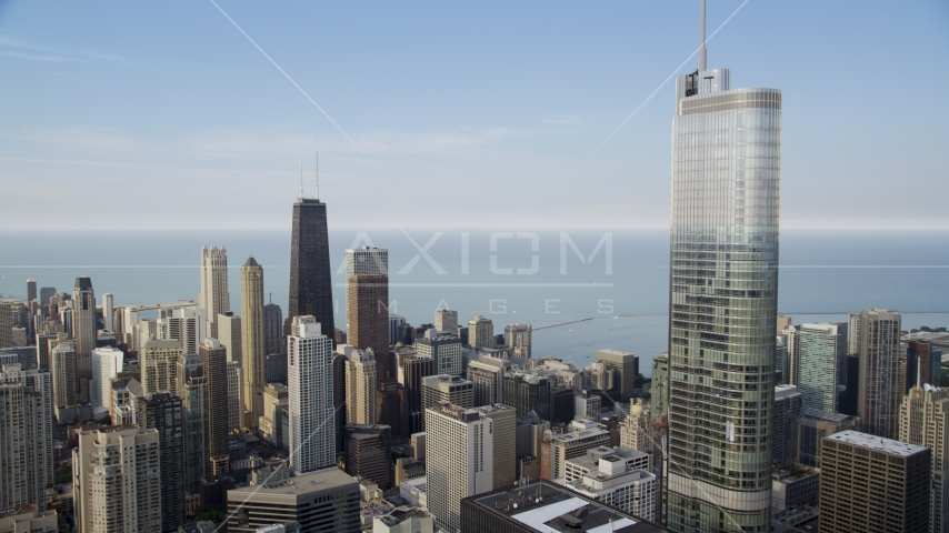 John Hancock Center seen from near the Trump Tower skyscraper, Downtown Chicago, Illinois Aerial Stock Photo AX0001_048.0000365F | Axiom Images