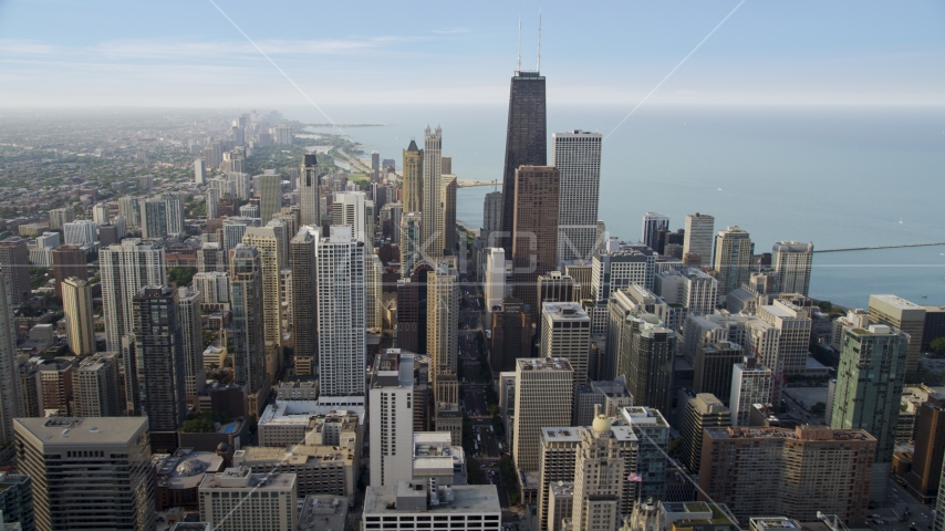 A view across downtown at John Hancock Center, Downtown Chicago, Illinois Aerial Stock Photo AX0001_049.0000424F | Axiom Images