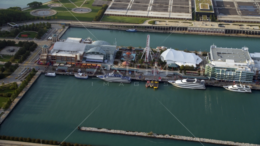 A view of Ferris Wheel on Navy Pier in Chicago, Illinois Aerial Stock Photo AX0001_122.0000207F | Axiom Images