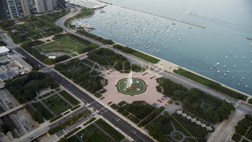 The Buckingham Fountain in Grant Park near boats in the harbor, Downtown Chicago, Illinois Aerial Stock Photo AX0001_151.0000000F | Axiom Images