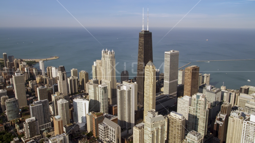 John Hancock Center and Downtown Chicago skyscrapers, Illinois Aerial Stock Photo AX0002_011.0000284F | Axiom Images