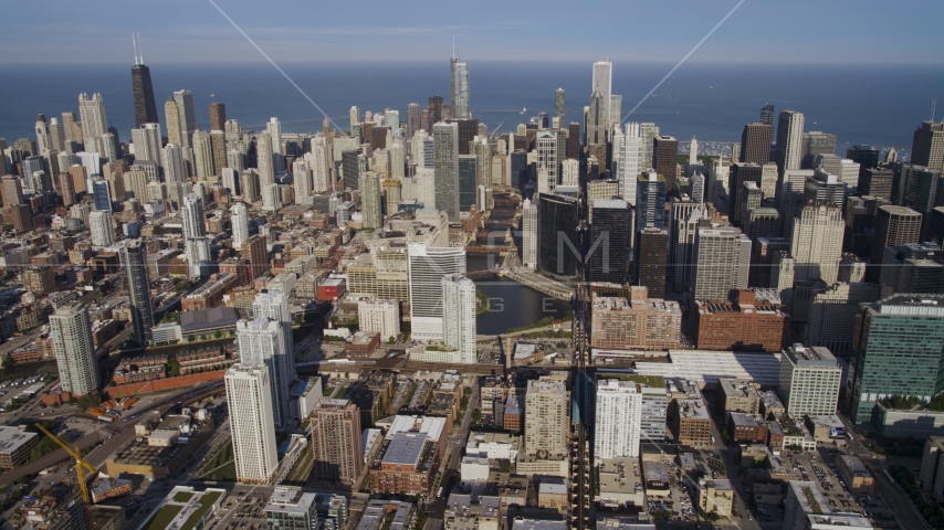 A view from West Chicago at Downtown Chicago skyscrapers around the Chicago River, Illinois Aerial Stock Photo AX0002_036.0000315F | Axiom Images