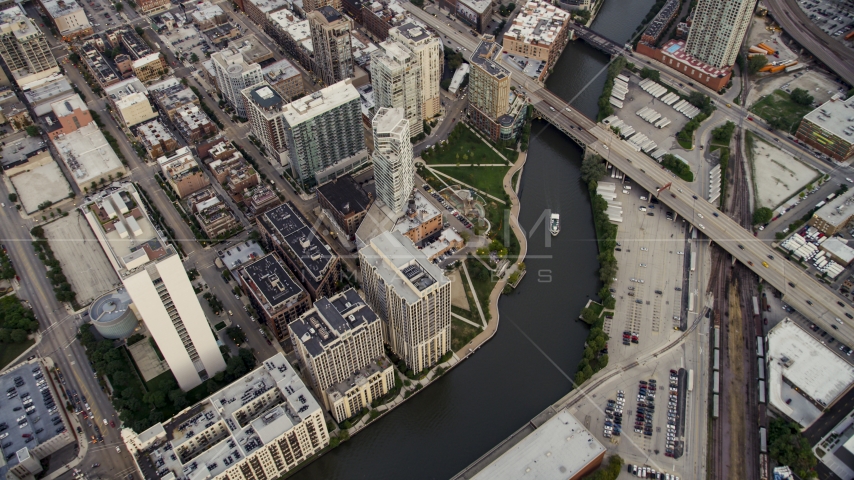 The Chicago River and Downtown Chicago city buildings at sunset, Illinois Aerial Stock Photo AX0003_058.0000000F | Axiom Images