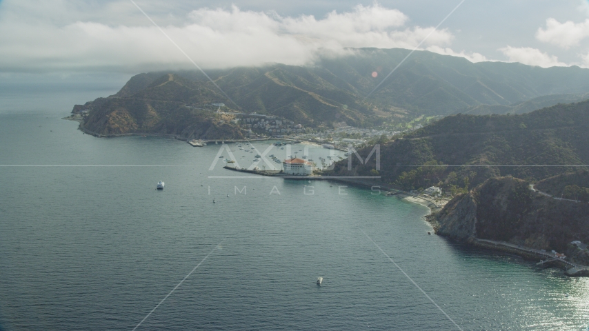 The harbor and the island town of Avalon, Santa Catalina Island, California Aerial Stock Photo AX0159_260.0000408 | Axiom Images