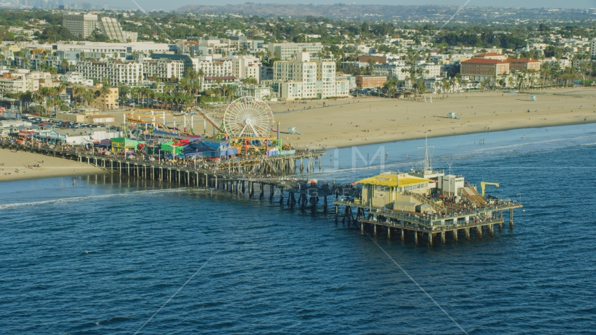 Tourists walking on Santa Monica Pier in Santa Monica, California Aerial Stock Photo AX0161_081.0000286 | Axiom Images