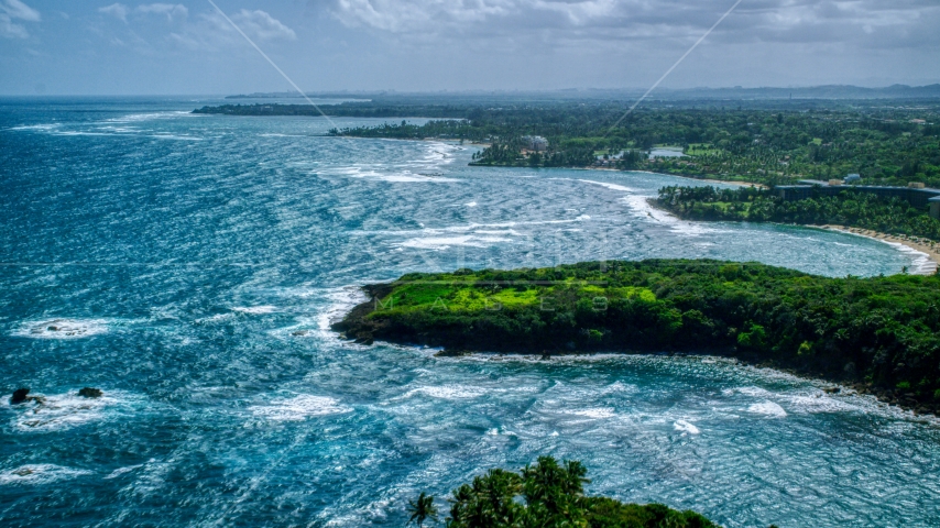 A Caribbean island coast in Vega Alta, Puerto Rico  Aerial Stock Photo AX101_212.0000000F | Axiom Images