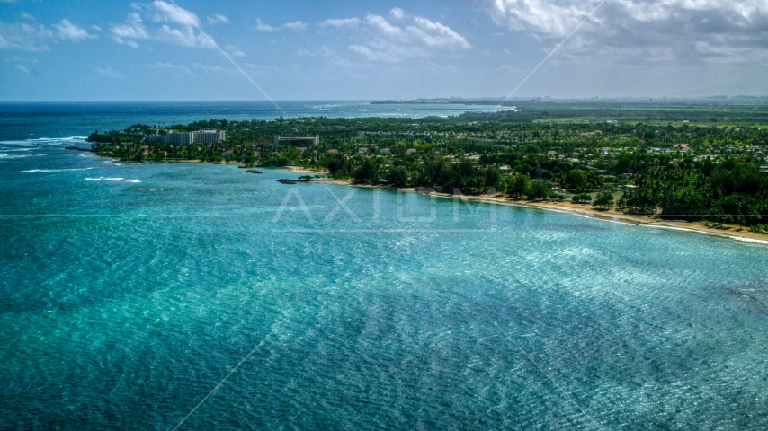 Caribbean island community on the coast in Dorado, Puerto Rico Aerial Stock Photo AX101_216.0000224F | Axiom Images