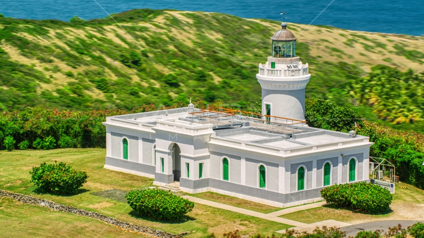 Cape San Juan Light in Fajardo, Puerto Rico Aerial Stock Photo AX102_065.0000000F | Axiom Images