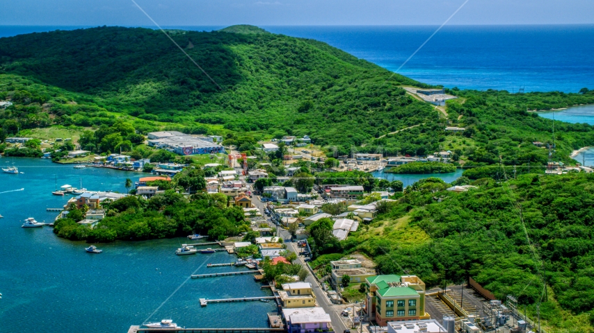 Small shops in a coastal town in Culebra, Puerto Rico Aerial Stock Photo AX102_145.0000055F | Axiom Images