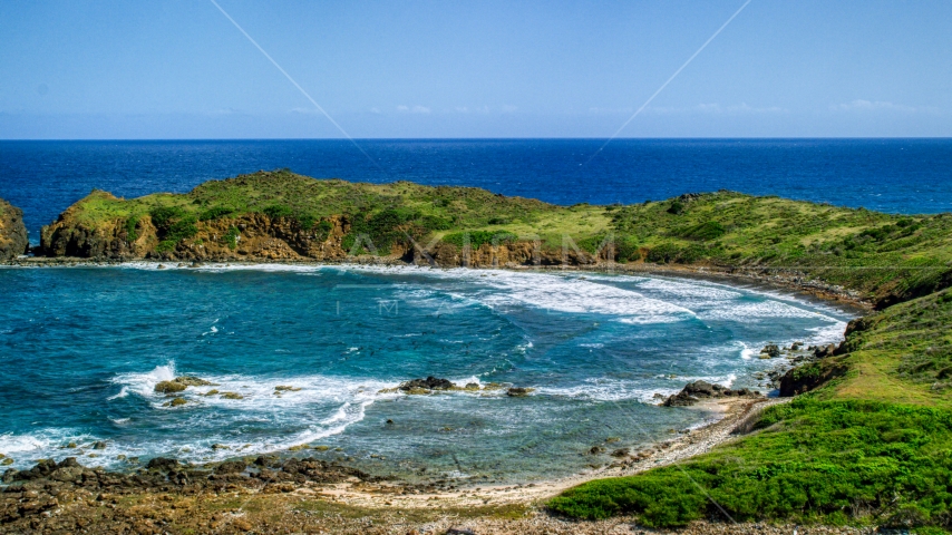 Waves rolling in toward the island coast, Culebrita, Puerto Rico  Aerial Stock Photo AX102_190.0000096F | Axiom Images