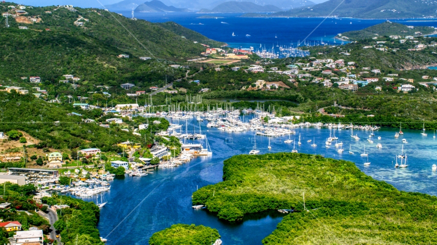 Boats docked at a marina in Benner Bay, St Thomas, US Virgin Islands  Aerial Stock Photo AX102_238.0000000F | Axiom Images