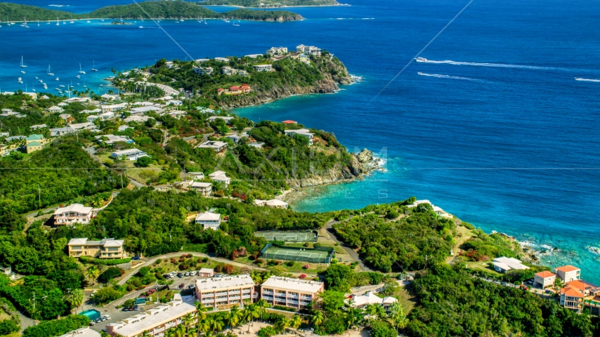 Upscale oceanfront homes beside sapphire blue waters, East End, St Thomas  Aerial Stock Photo AX102_246.0000000F | Axiom Images