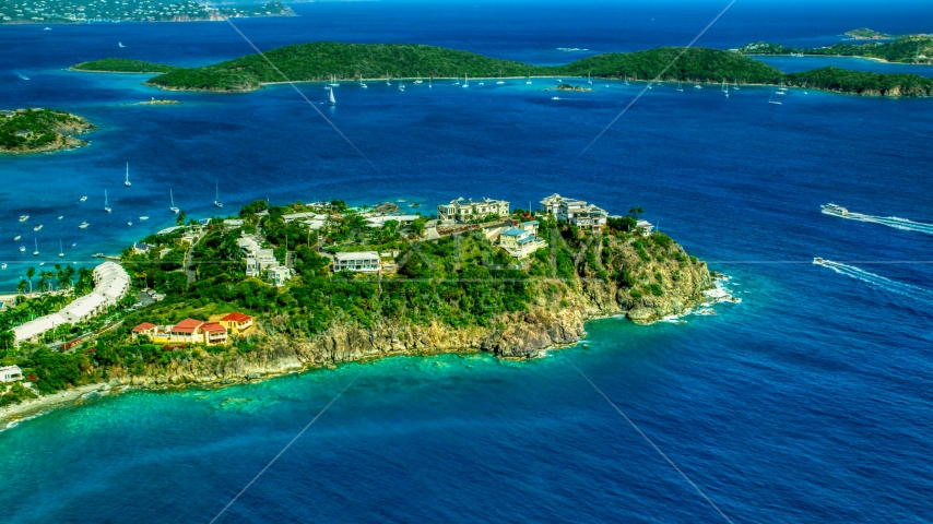 Hillside oceanfront homes overlooking sapphire blue waters, East End, St Thomas  Aerial Stock Photo AX102_247.0000000F | Axiom Images