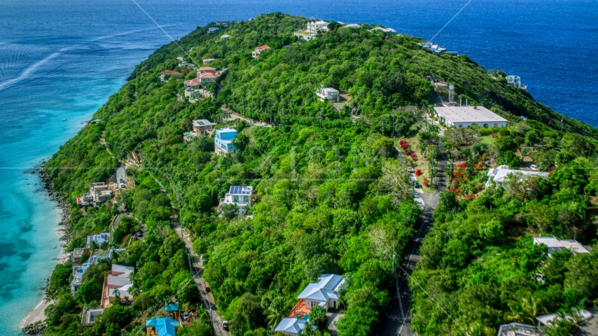 Hillside island homes overlooking the turquoise blue Caribbean waters, Magens Bay, St Thomas Aerial Stock Photo AX102_275.0000089F | Axiom Images