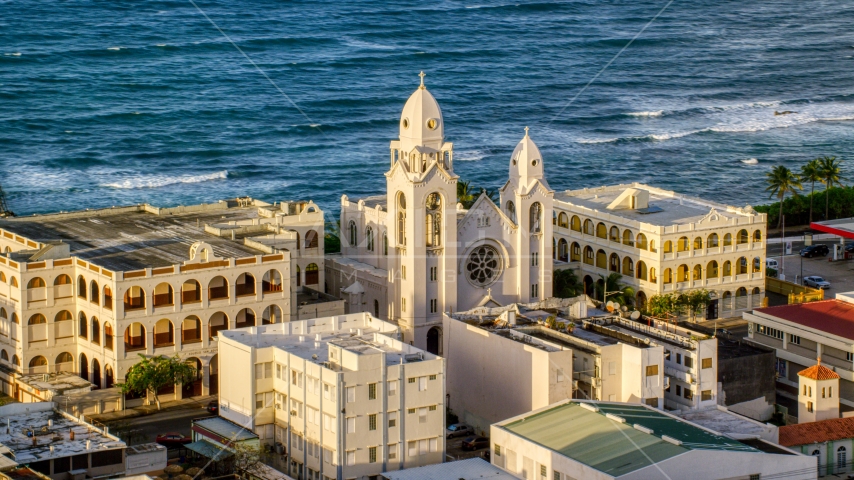 Iglesia San Agustín cathedral in Old San Juan, sunset Aerial Stock Photo AX104_002.0000204F | Axiom Images