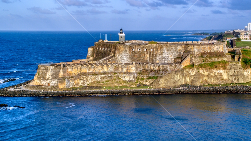 Iconic Fort San Felipe del Morro, Old San Juan, sunset Aerial Stock Photo AX104_006.0000203F | Axiom Images