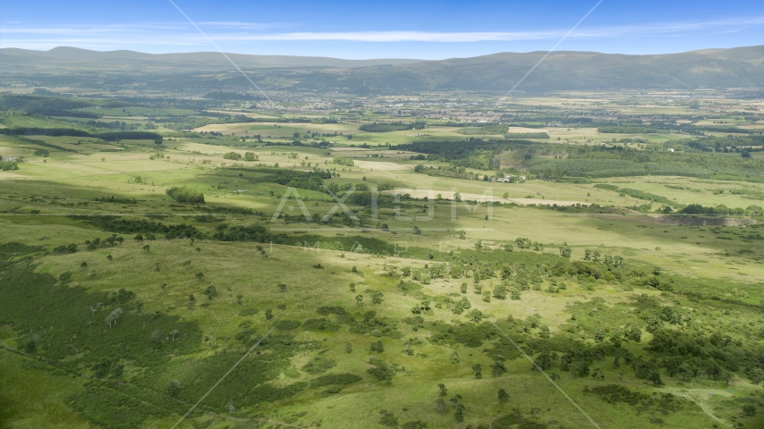 Farms in a green rural landscape, Stirling, Scotland Aerial Stock Photo AX109_007.0000000F | Axiom Images