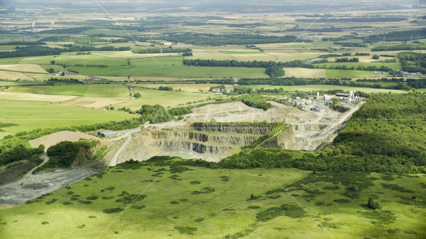 A quarry surrounded by farmland, Denny, Scotland Aerial Stock Photo AX109_008.0000000F | Axiom Images