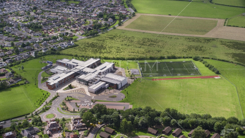 Wallace High School and soccer field, Stirling, Scotland Aerial Stock Photo AX109_054.0000000F | Axiom Images