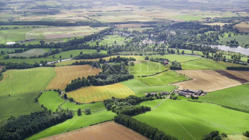 Farms and green farm fields in Blair Drummond, Scotland Aerial Stock Photo AX109_064.0000000F | Axiom Images