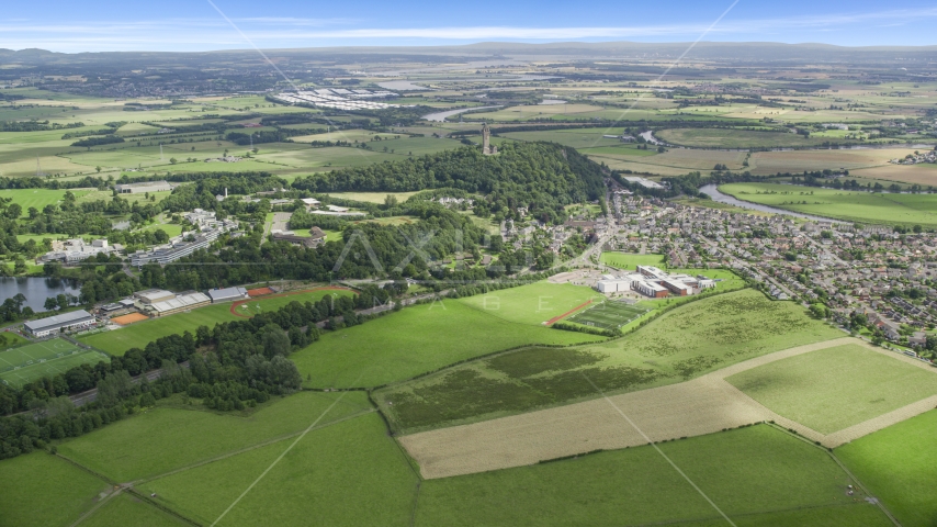 The Wallace Monument in the middle of a residential area, Scotland Aerial Stock Photo AX109_097.0000000F | Axiom Images