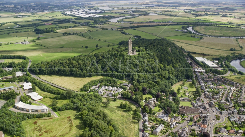 Historic Wallace Monument atop Abbey Craig hill, Stirling, Scotland Aerial Stock Photo AX109_099.0000000F | Axiom Images