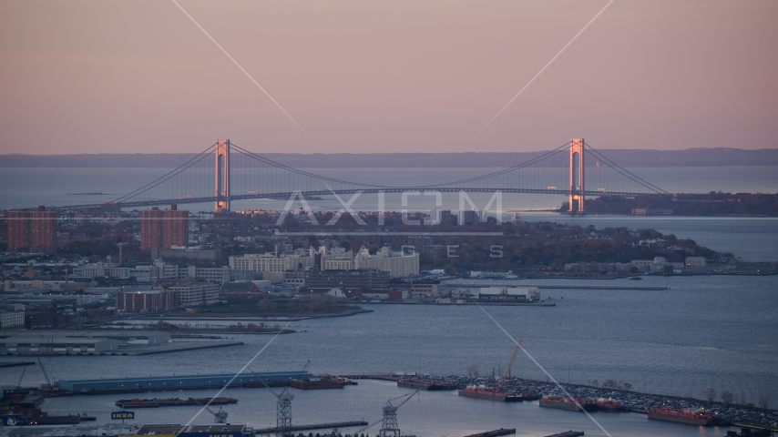 Verrazano-Narrows Bridge and waterfront apartment buildings at sunrise, New York City Aerial Stock Photo AX118_061.0000092F | Axiom Images