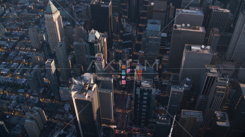 Giant screens at Times Square at sunrise in Midtown Manhattan, New York City Aerial Stock Photo AX118_185.0000000F | Axiom Images