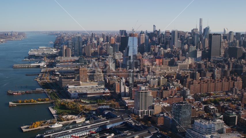 Chelsea Piers and riverfront buildings, Hudson Yards, and Midtown skyscrapers in New York City Aerial Stock Photo AX119_024.0000104F | Axiom Images