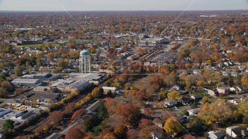 Industrial buildings and train tracks in Autumn, Farmingdale, New York Aerial Stock Photo AX119_255.0000120F | Axiom Images