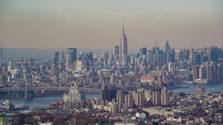 Midtown Manhattan skyline across the East River, seen from Brooklyn in Autumn, New York City Aerial Stock Photo AX120_083.0000197F | Axiom Images