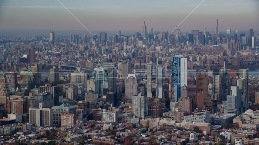 Downtown Brooklyn skyscrapers in Autumn, Midtown in the background, New York City Aerial Stock Photo AX120_087.0000088F | Axiom Images