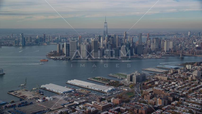 Lower Manhattan skyscrapers across the East River in Autumn, New York City Aerial Stock Photo AX120_089.0000077F | Axiom Images