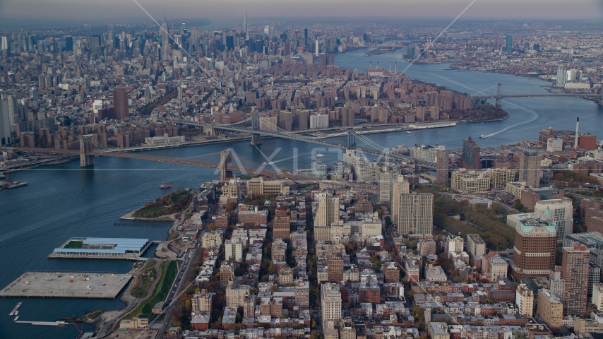 The Brooklyn and Manhattan Bridges spanning the East River in Autumn, New York City Aerial Stock Photo AX120_091.0000087F | Axiom Images