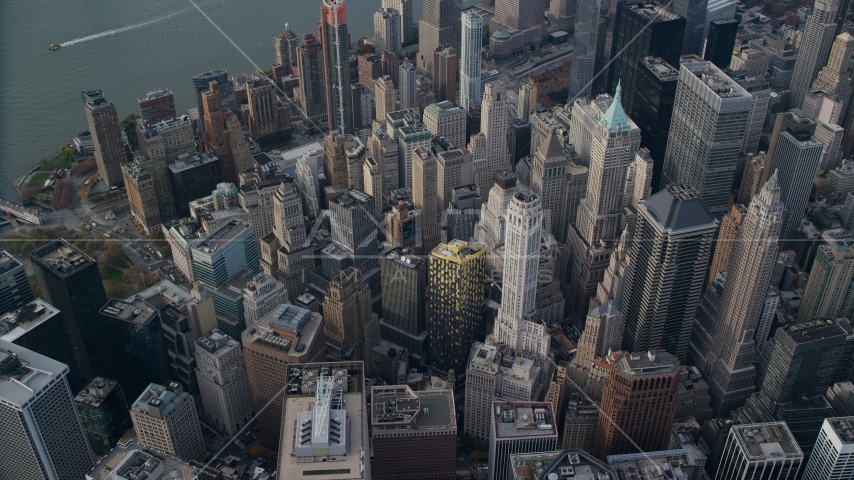 Lower Manhattan skyscrapers and high-rise buildings in Autumn, New York City Aerial Stock Photo AX120_097.0000028F | Axiom Images