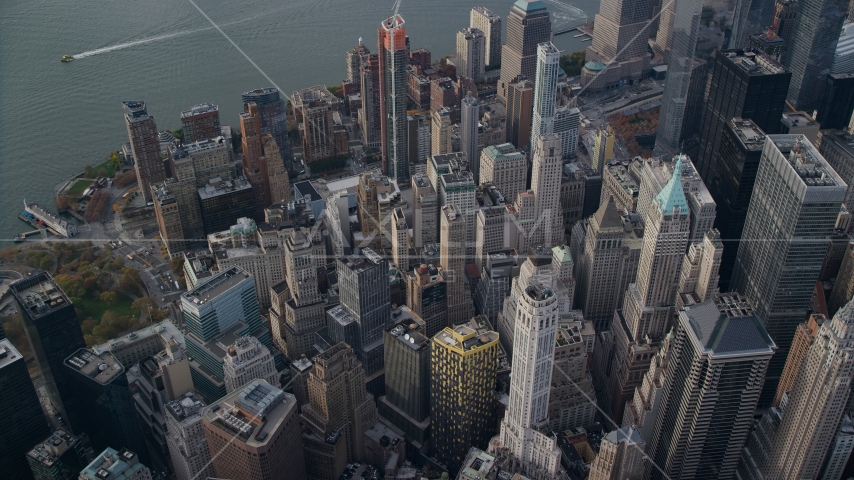 A view of Lower Manhattan skyscrapers and high-rise buildings in Autumn, New York City Aerial Stock Photo AX120_097.0000283F | Axiom Images