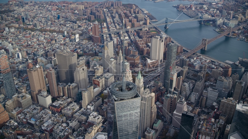 Top of Freedom Tower and East River bridges in Lower Manhattan, New York City Aerial Stock Photo AX120_103.0000178F | Axiom Images