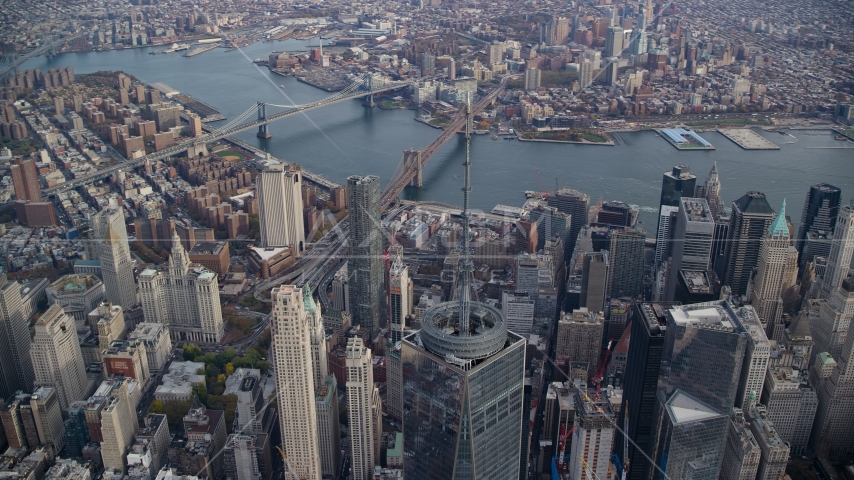 One World Trade Center spire, East River and bridges in Lower Manhattan, New York City Aerial Stock Photo AX120_104.0000143F | Axiom Images