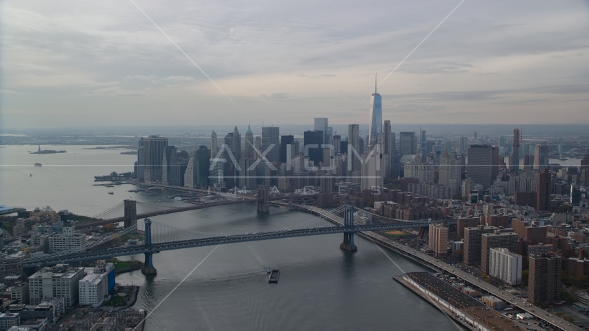 Lower Manhattan S=skyscrapers by the Brooklyn and Manhattan Bridges, New York City Aerial Stock Photo AX120_142.0000057F | Axiom Images