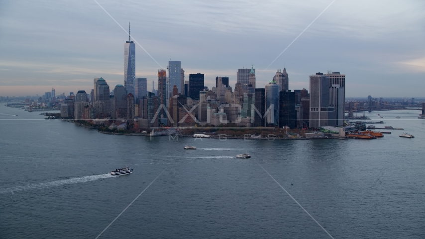 Battery Park and Lower Manhattan skyscrapers at sunset, New York City Aerial Stock Photo AX121_017.0000261F | Axiom Images