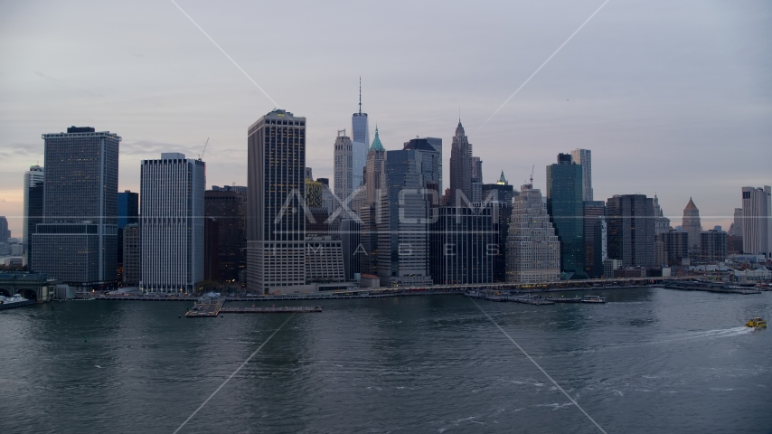 Lower Manhattan riverfront skyline at sunset, New York City Aerial Stock Photo AX121_021.0000157F | Axiom Images