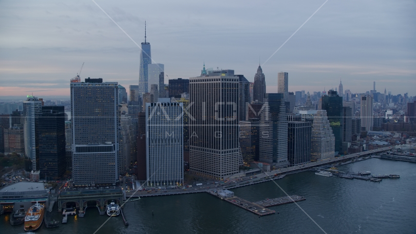 Riverfront skyscrapers beside the Hudson River at sunset, Lower Manhattan, New York City Aerial Stock Photo AX121_036.0000087F | Axiom Images