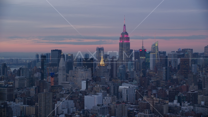 Empire State Building and Midtown skyscrapers at sunset in Midtown, New York City Aerial Stock Photo AX121_077.0000073F | Axiom Images