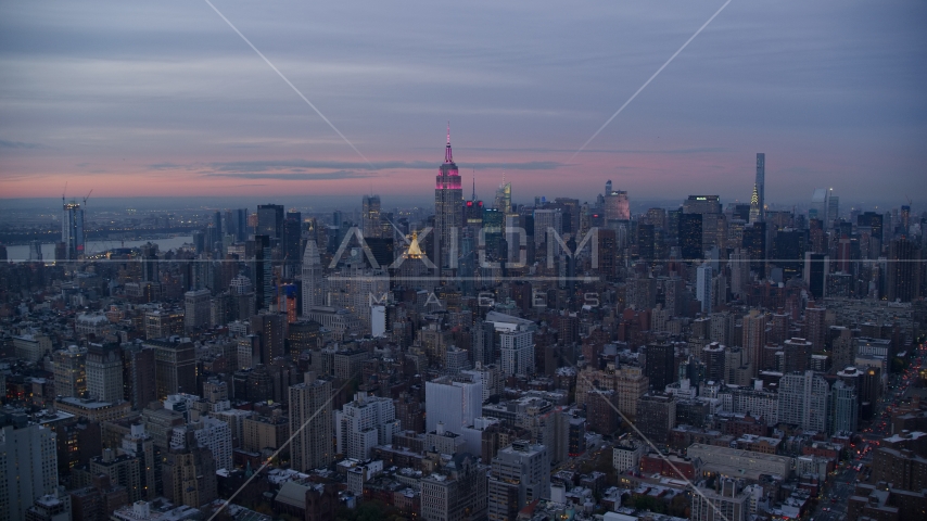 Empire State Building and Midtown skyscrapers at sunset in New York City Aerial Stock Photo AX121_078.0000126F | Axiom Images