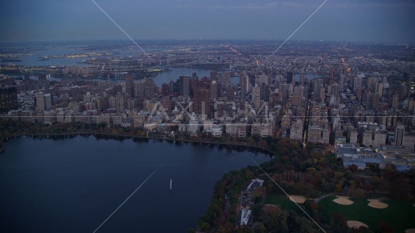 Upper East Side apartment buildings near Central Park at sunset, New York City Aerial Stock Photo AX121_096.0000100F | Axiom Images