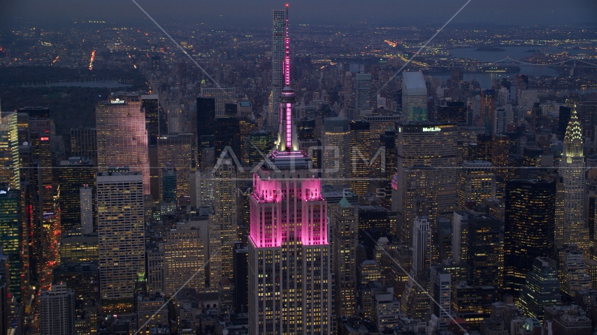 The top half of Empire State Building at sunset in Midtown, New York City Aerial Stock Photo AX121_110.0000032F | Axiom Images