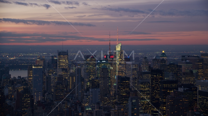 Tall Midtown Manhattan towers at sunset in New York City Aerial Stock Photo AX121_115.0000025F | Axiom Images